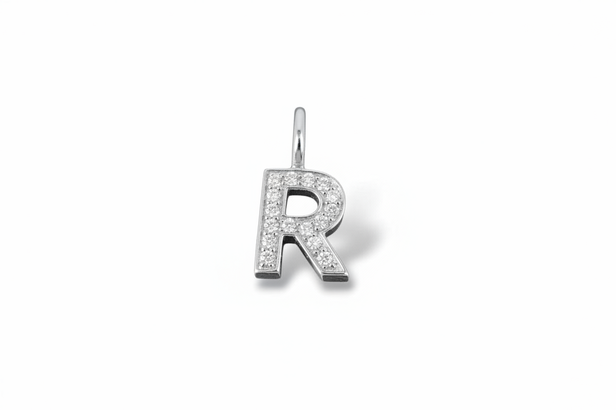 LETTER HÄNGE 18K VITGULD